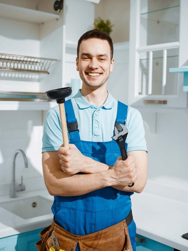 cheerful-male-plumber-holds-wrench-and-plunger-resize.jpg cheerful-male-plumber-holds-wrench-and-plunger-resize.jpg